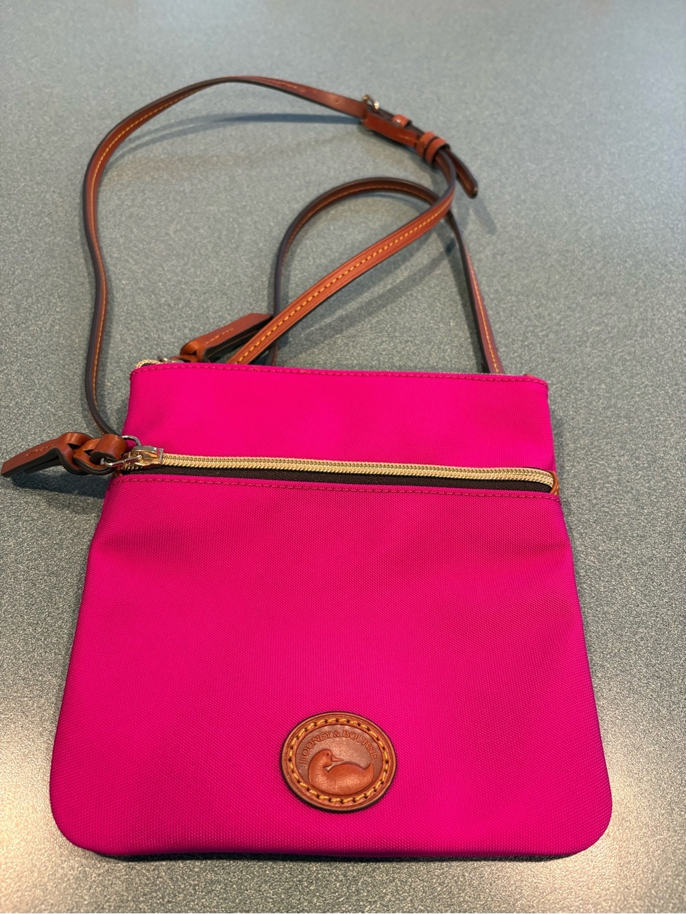 Dooney and Bourke  Hot Pink Crossbody Bag with Tan Leather Trim new without tags